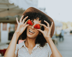 Smiling Woman with Strawberries