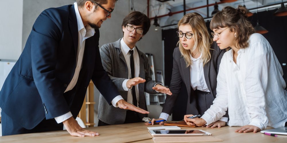 Business people having discussion, dispute or disagreement at meeting or Resolving problems